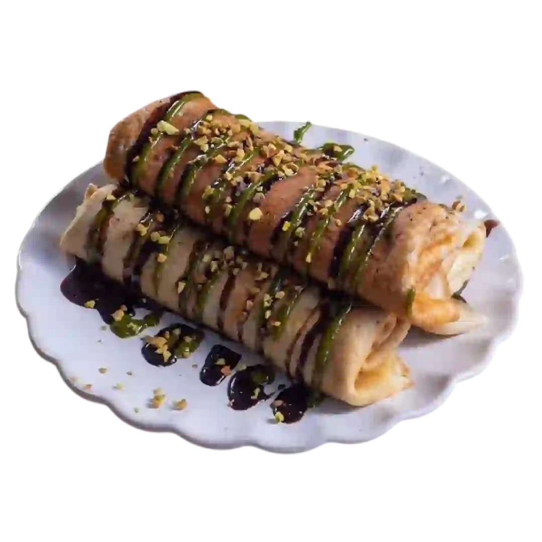 Pistachio pancakes, nutty pancakes, pistachio dessert, fluffy pancakes, Middle Eastern pancakes, sweet pancakes, Qashati Al Sham menu, pistachio breakfast